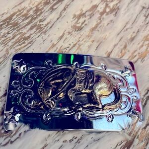 End of the Trail Cowboys Horse with head down Vintage reflective belt buckle
